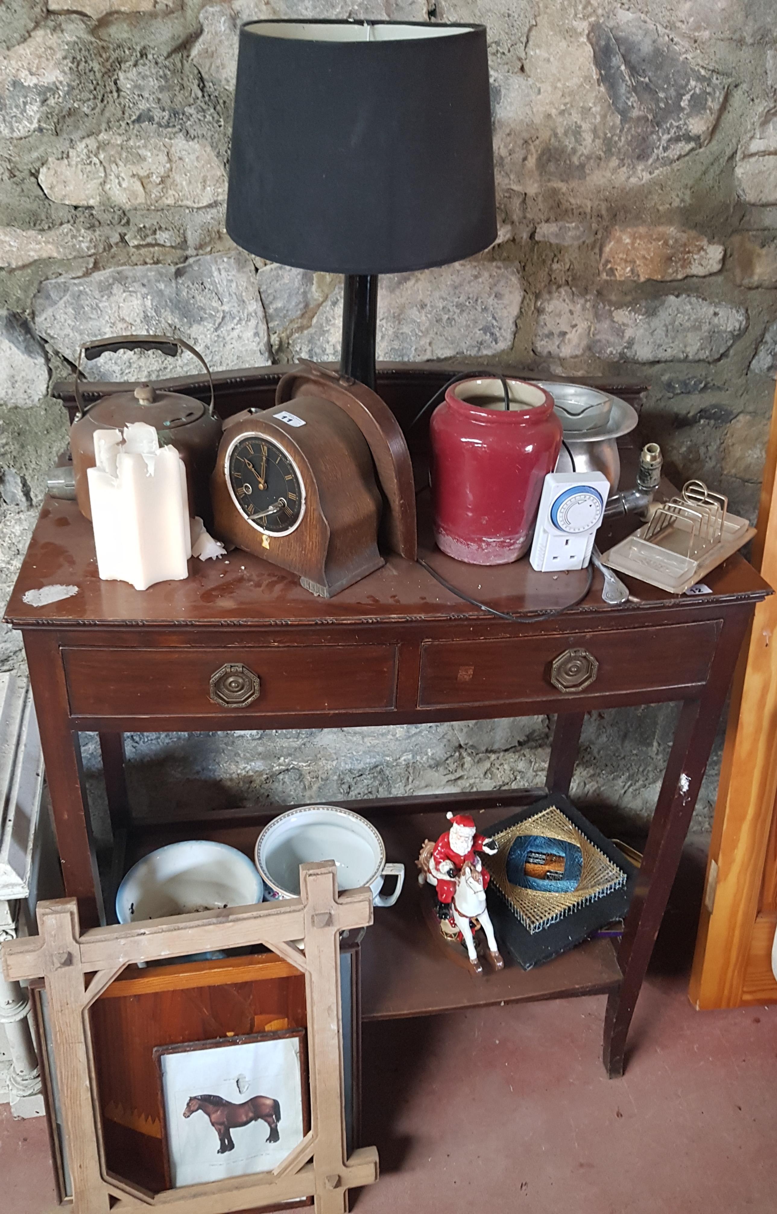 A quantity of various Vintage Items on two shelves.