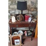A quantity of various Vintage Items on two shelves.