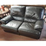 A Good Modern Black Leather two seater Sofa.