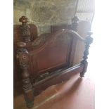 A 19th Century highly carved Headboard along with another and three leaves of 19th Century Mahogany.