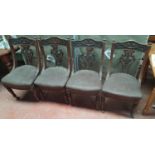 A Set of four late 19th early 20th Century Walnut Chairs.