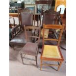 A pair of Early 20th Century Armchairs along with two Dining Chairs.