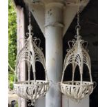 Two Painted Hanging baskets.