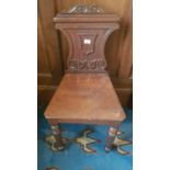 A pair of William 1Vth Mahogany Hall Chairs with carved shield backs.