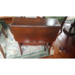 An Edwardian Mahogany Inlaid Sutherland Table with gate leg.