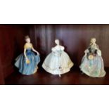 Three Royal Doulton Figures 'Melanie' HN2271, 'Nicola' HN2839 and 'First Dance' HN2803.
