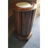 A 19th Century Mahogany Pot Cupboard with a marble top.