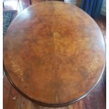 A really good 19th Century Walnut Inlaid oval Supper Table. L 144 W 112 H 70cm.