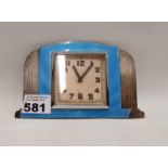 An Art Deco Silver and Enamel Carriage Clock.