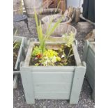 Two very large Timber Planters.