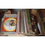 A quantity of LP's and singles in one box.