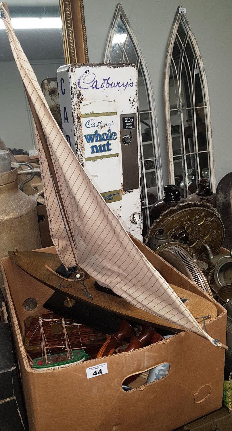 A Vintage Model Boat along with other vintage items to include brass and pewter wares.