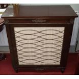 A 19th Century Mahogany Side Cabinet with a brass grilled door and pleated fabric.W 76 H 89 D 36.