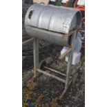 A mobile Bar-B-Q made from an old beer keg.