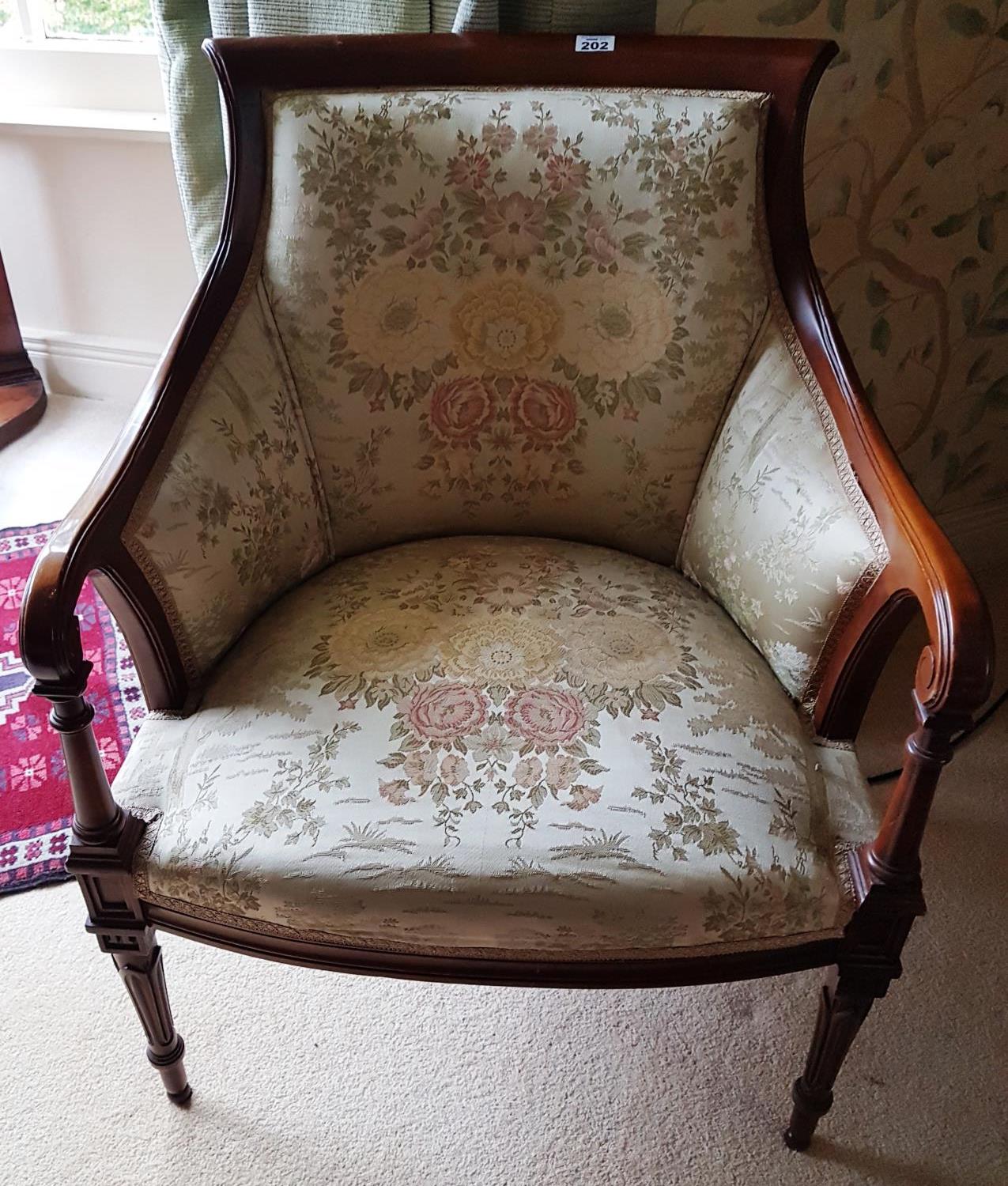 A good Mahogany Showframe Tub Chair with a floral and classical scene fabric.