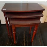 A 20th Century Mahogany Nest of three Tables.