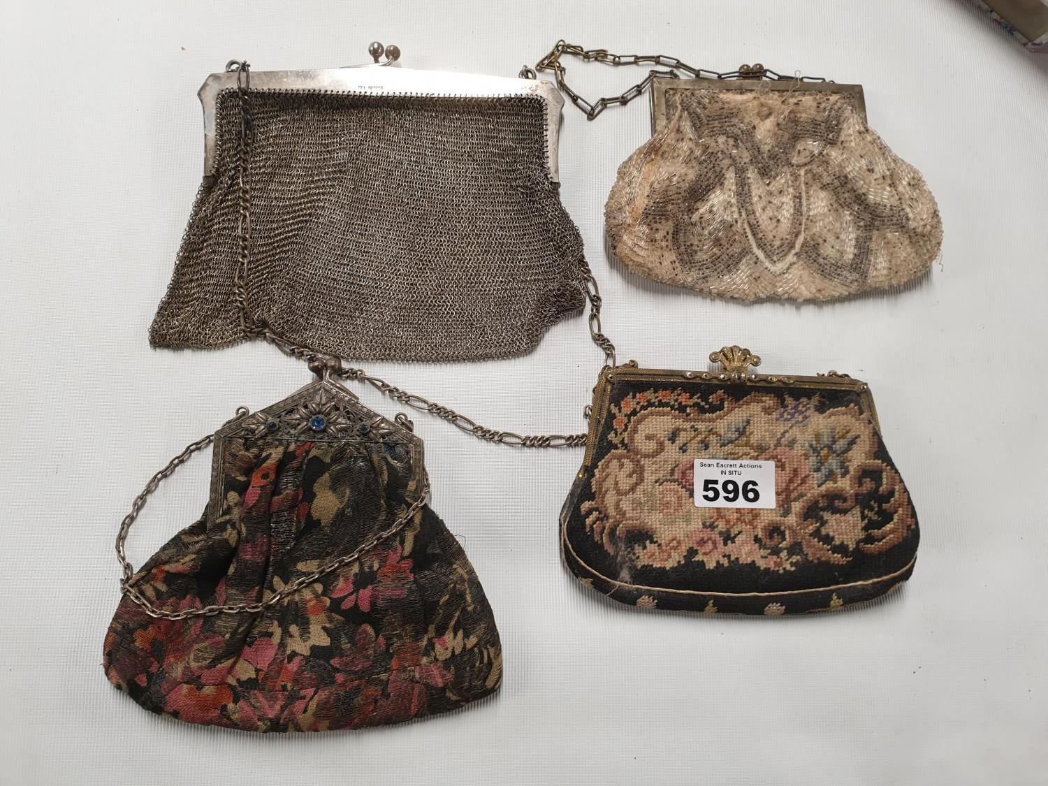 A solid silver Purse along with an Indian example and two others.