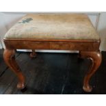 A 19th Century Walnut Stool with Queen Anne shaped legs and tapestry upholstery.