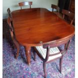 A really good Victorian Mahogany D end Dining Table with turned fluted supports and brass castors.