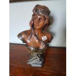 A Bronze Bust of a Female. 35 cms h.