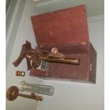 A 19th Century Brass Microscope with timber case and accessories.
