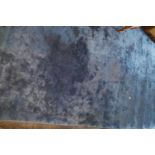 A large Blue Ground Rug. 360 x 210cm.