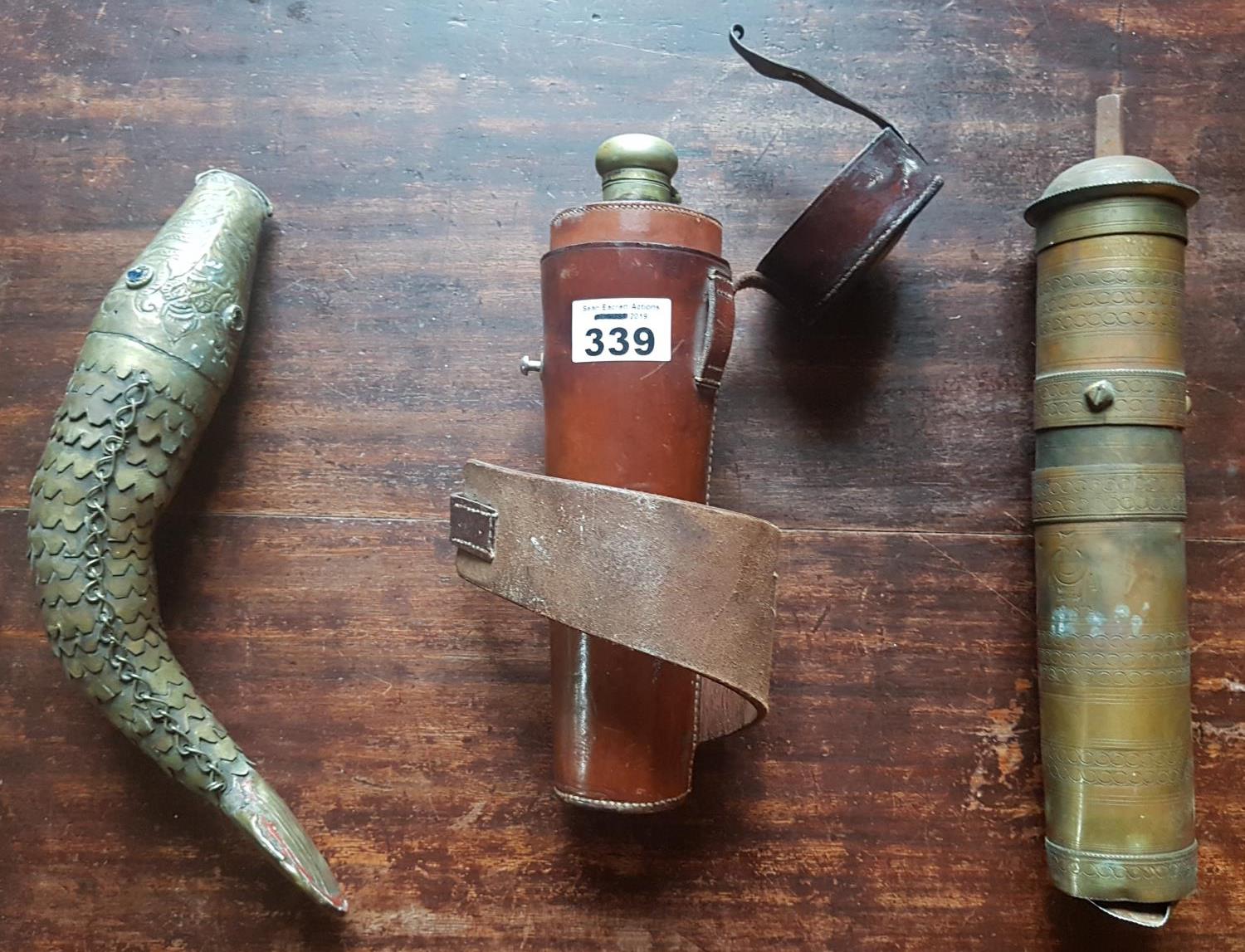 A 19th Century Military Hip Flask, a brass Indian fish and another item.