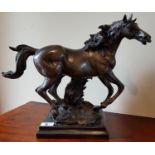 A good Bronze Sculpture of a Horse. Makers name indistinct. 31 x 40cm.