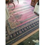 A large Cream and pink Ground Rug with multi borders and allover decoration.