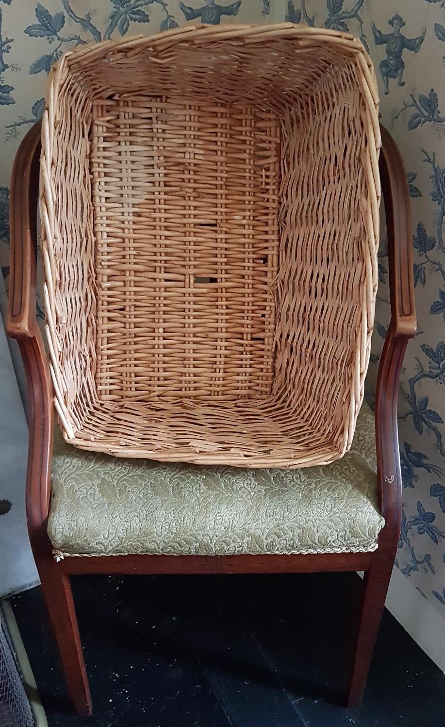 A set of three late 19th Century Satinwood Tub Chairs with ebony inlay on square supports.