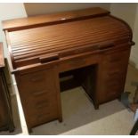 A 19th Century Oak Roll top Desk. (no key).