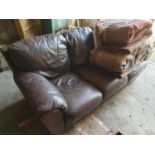 A leather Three Seater Couch.