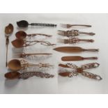 A rare collection of 19th Century hand carved wooden Knives, Forks and Spoons from South India.