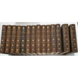 A set of twenty five half calf leather bindings Land & Water edition with illustrations.