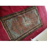 A well worn early 20th Century Iranian Tribal Rug.