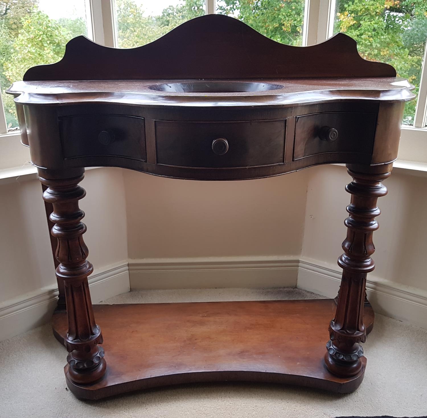 A good 19th Century Serpentine fronted Washstand with turned and fluted supports on a platform base. - Image 2 of 2