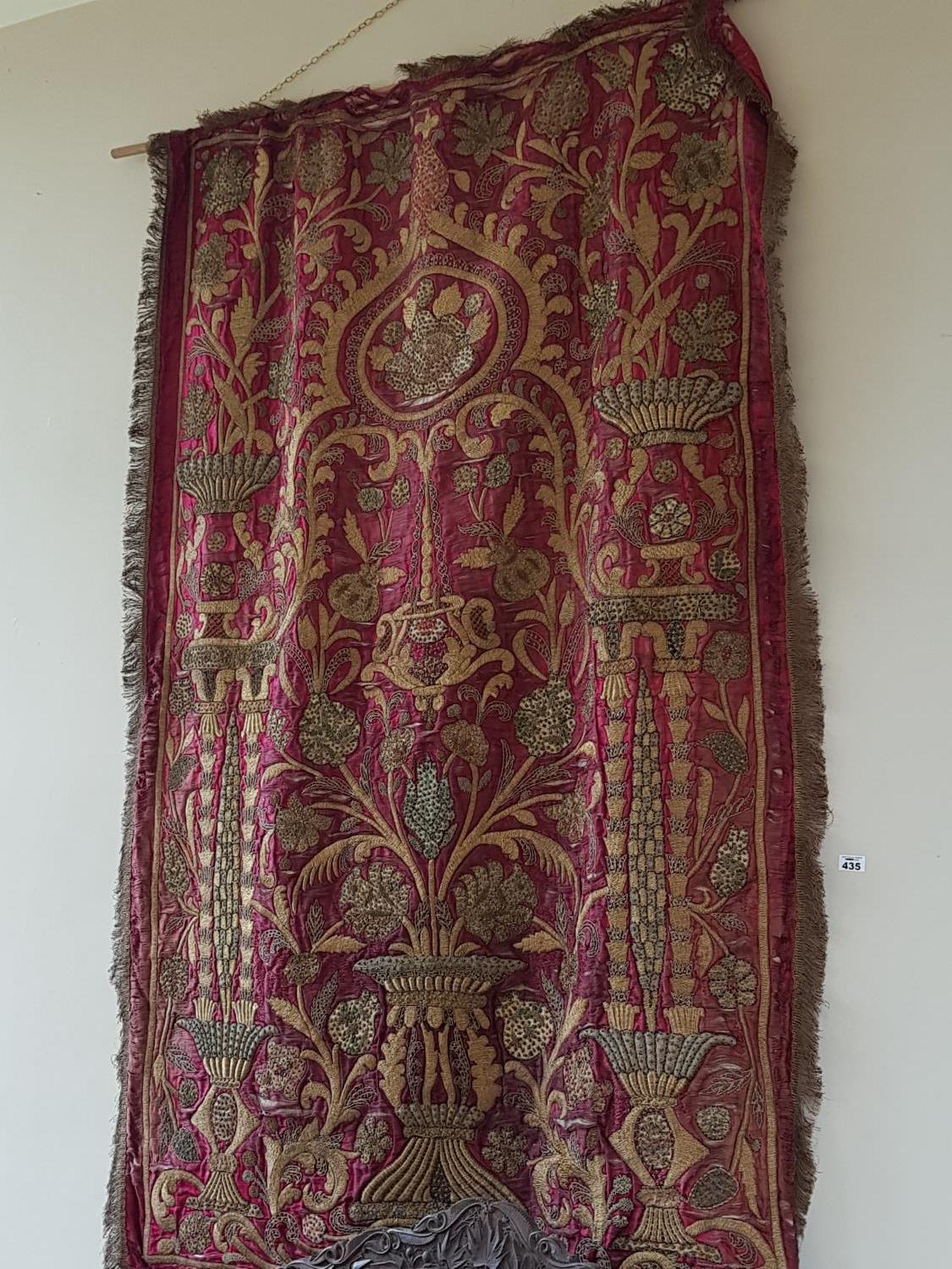 A 19th Century Silk and Needlework Tapestry with burgundy ground.