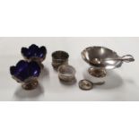 Two Irish silver Salts, West and sons along with a silver napkin Ring, Spoon & a group of Silver