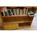 A quantity of Books in pine bookcase to include National Geographic.