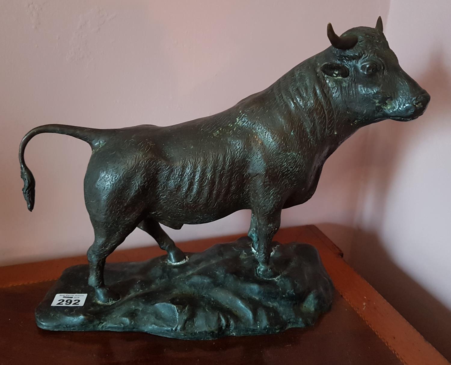 A Bronze Figure of a Bull in a serious stance. 32cm.