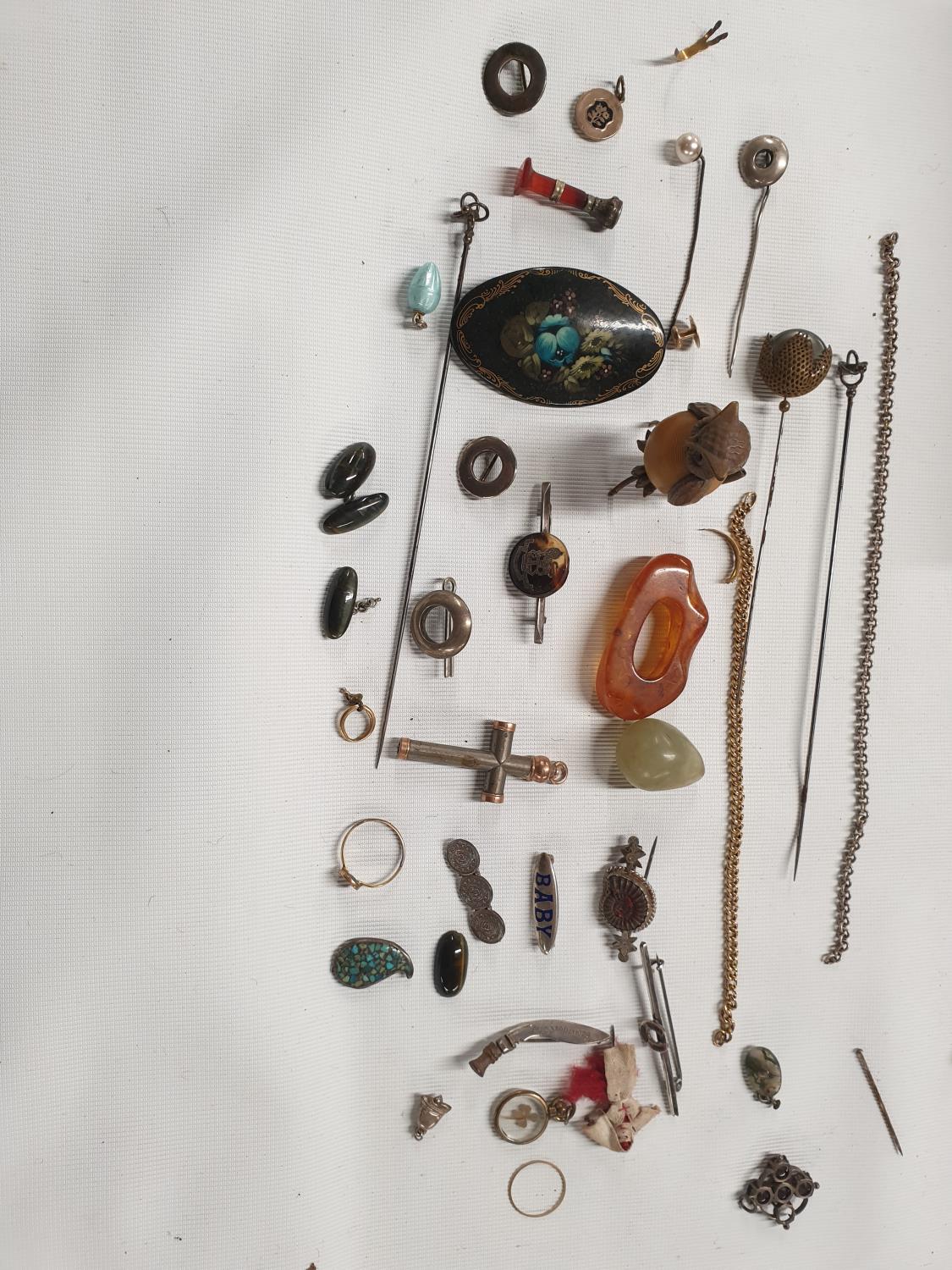 A quantity of Hat Pins, Brooches and other items, some silver and gold.