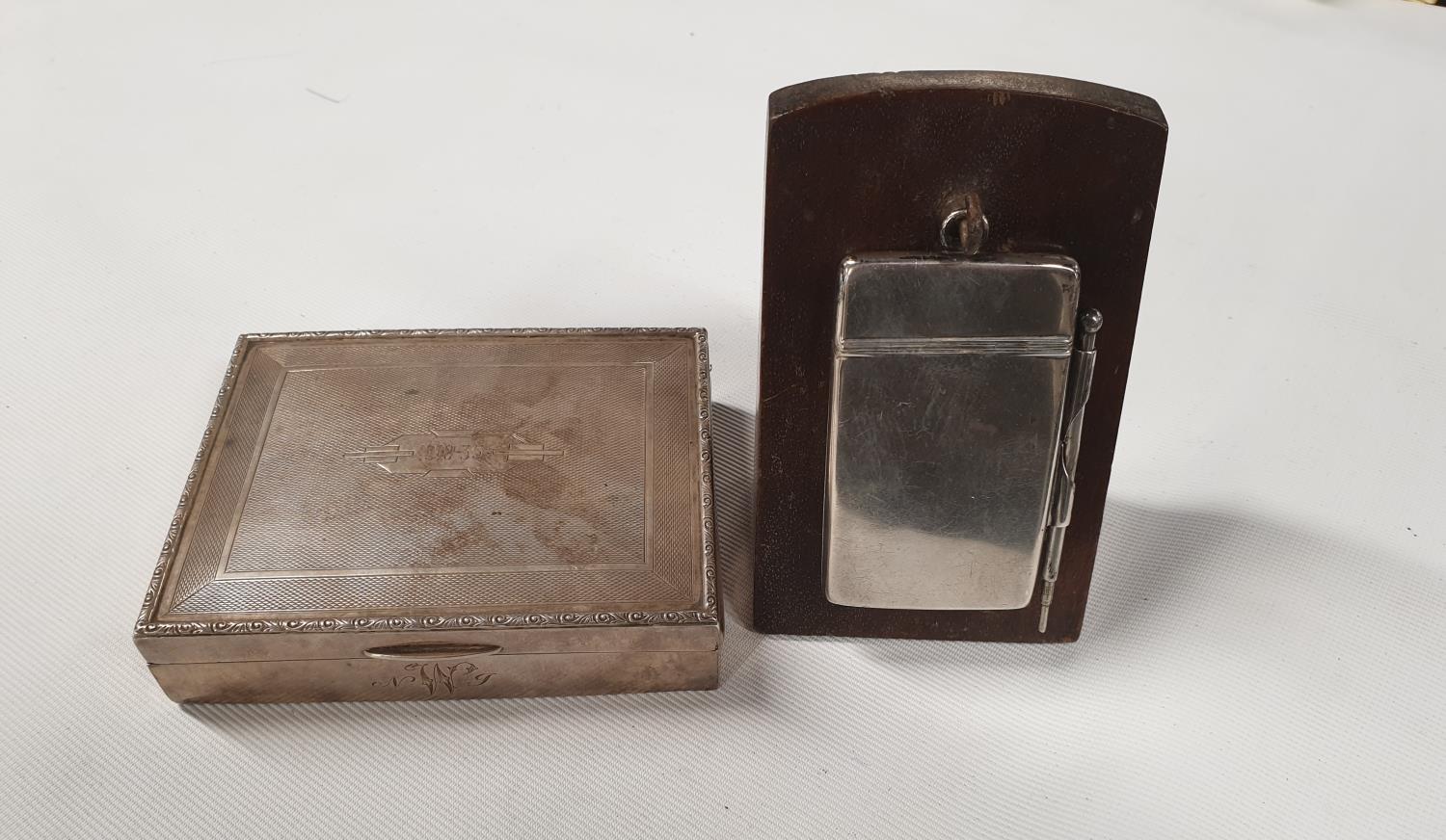 A Silver hallmarked Cigarette Case along with a Birmingham silver Card Case.