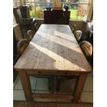 A large 19th Century Pine Kitchen Table with stretcher base. 224cm(L) x 91cm(W) x 77cm(H).