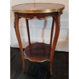 A Continental Rosewood and Ormolu Side Table. H72 x 45cm diameter.