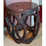 A really good 19th Century Oriental Hardwood Urn Table. (slight damage to top). H45 x 40cm diameter.