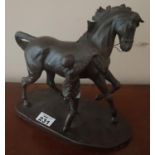 A Bronzed Figure of a horse and rider. 22cm.