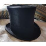 One Locks & Co London Top Hat with original case. One has been removed which is not in photo.