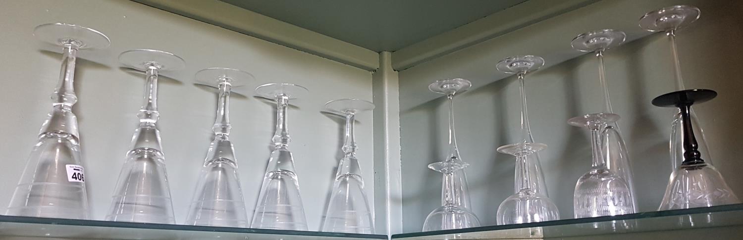 A group of various Glasses to include Champagne Flutes.