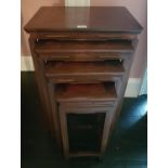 A really good Nest of four Oriental Hardwood Tables with trade label for Ernest Cullen, Dublin