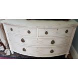 A Bow fronted painted Chest of Drawers ensuite to wardrobe Lot 121. 129 x 63 x 76cm.